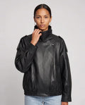 Blouson effet cuir à col montant noir Octavie, plan rapproché en studio