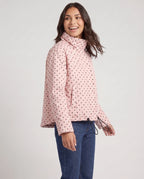Bomber court à pois rose Célestine, vue de trois quarts en studio