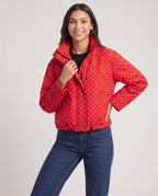 Bomber court à pois rouge Célestine, vue de trois quarts en studio