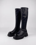 Bottes hautes cavalières en simili Baptistine — Noir, paire vue de trois quarts en studio