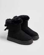 Bottes de neige à nœud et col fourrure Opaline — Noir, paire en packshot studio