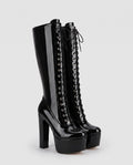 Bottes hautes vernies lacées à plateforme Vitaline — Noir, paire en packshot studio