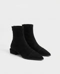 Bottines chaussette plates à bout pointu Célinie — Noir, paire en packshot studio