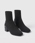 Bottines chaussettes en maille a talon bloc Cyprienne Noir — packshot studio