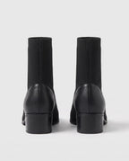Bottines chaussettes en maille a talon bloc Cyprienne Noir — packshot, second angle