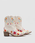 Bottines santiags à broderie florale en simili Émerance Blanc — packshot studio