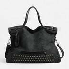 Grand sac à main bandoulière avec dessous clouté et charms pompon Giulia