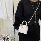 Petit sac à main bandoulière cubique matelassé au finition doré Aurore - image 12