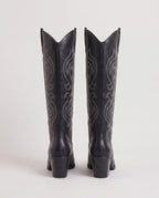 Bottes santiags hautes brodées Ghislaine — Noir, paire vue de dos avec les talons empilés