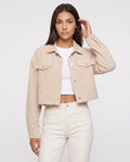 Veste courte en velours côtelé Y2K beige clair Sidonie, plan rapproché en studio