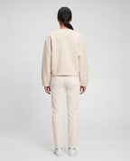 Veste zippée sans col en maille crème Capucine, vue de dos en studio