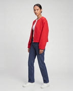 Veste zippée sans col en maille rouge Capucine, vue de trois quarts en studio